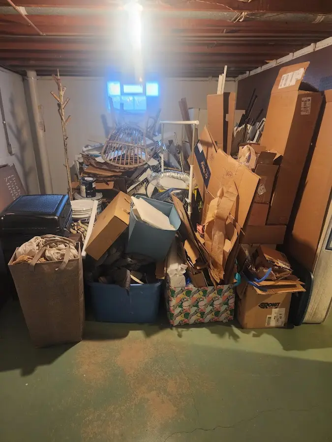 Roll-off dumpster container at job site for 2 Yard Dumpster Rental in Mount Olive